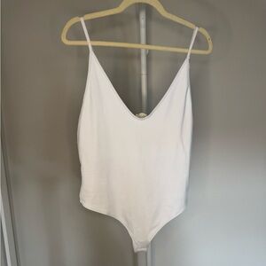 Free People women’s white bodysuit size L new with tags